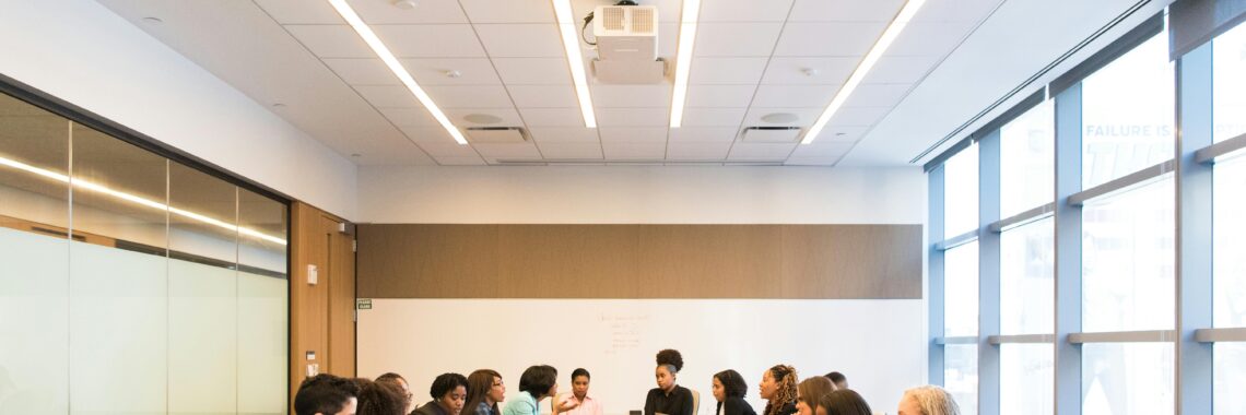 A multicultural team brainstorming and collaborating during a business meeting.